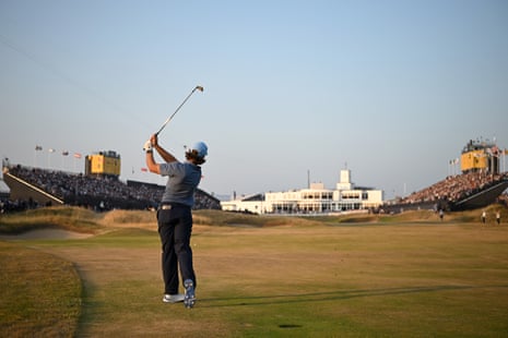 Tommy Fleetwood plays his second shot on the 18th.
