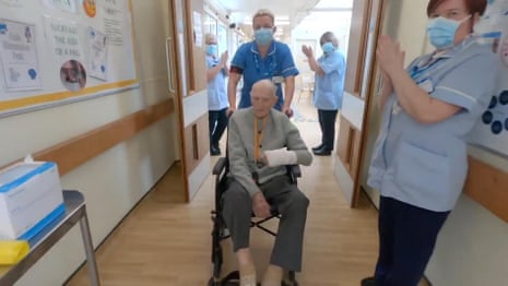 War veteran, 99, receives guard of honour from nurses after surviving coronavirus – video