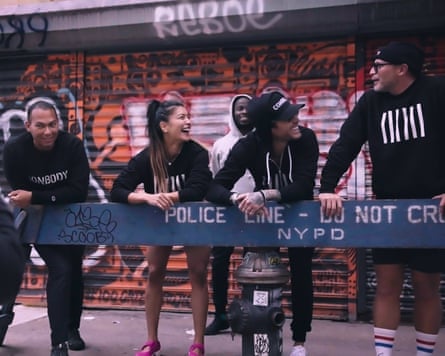 People behind a police barrier