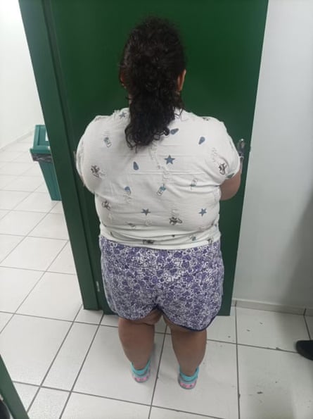 an image of a woman with her back turned