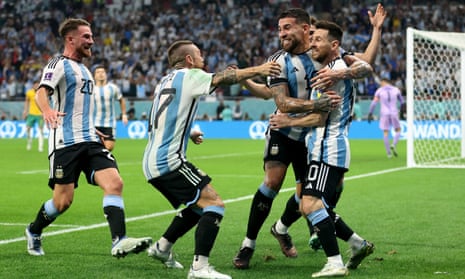 Argentina's Lionel Messi celebrates his first goal with his teammates