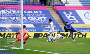 James Justin of Leicester City has a shot blocked by Liam Cooper.