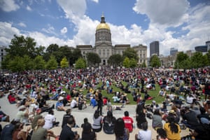 Hundreds of participants of the “OneRace Movement” listen to leaders inside Liberty Plaza, across the street form the Georgia State Capitol building.
