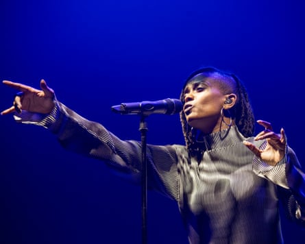 Woman singing on stage