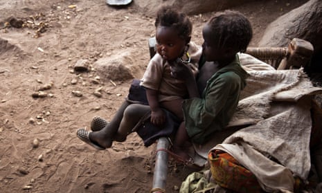 Thousands of people from the Nuba Mountains have been living in caves to escape airstrikes.