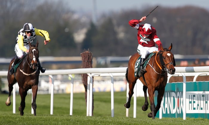 Tiger Roll and Davy Russell head towards the finishing post but Pleasant Company and David are closing fast!
