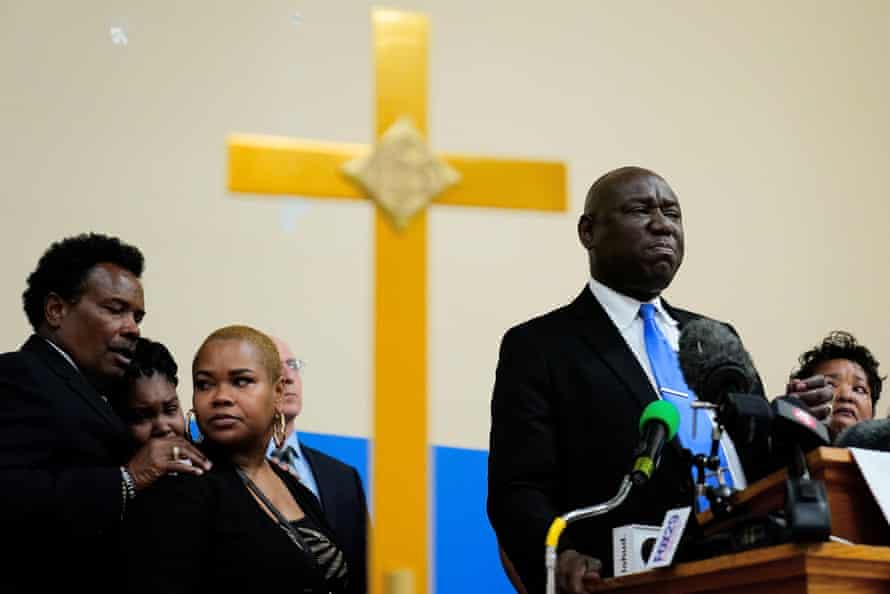 Attorney Benjamin Crump, accompanied by the family of Ruth Whitfield, a victim of shooting at Tops supermarket, speaks with members of the media during a news conference in Buffalo, on Monday.