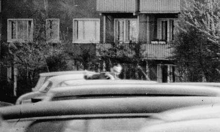 Leading Stasi official accidentally photographed as he leaves the flat where he was having an affair