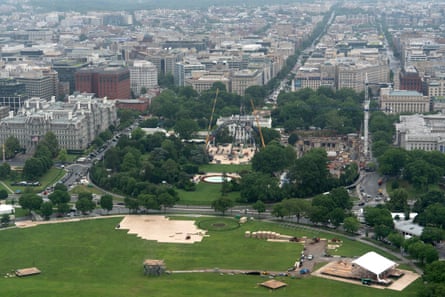 The cage and stage will themselves be surrounded by thousands of temporary seats.