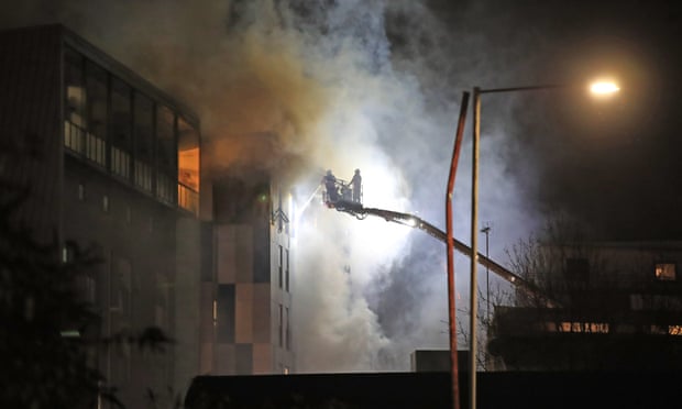 Firefighters tackle the blaze at The Cube in Bolton. 