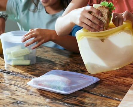 three silicone reusable bags with food