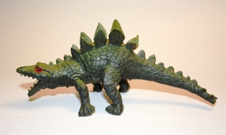 Rubber Stegosaurus complete with glowering red eyes, shark-like teeth and a lizard sprawl