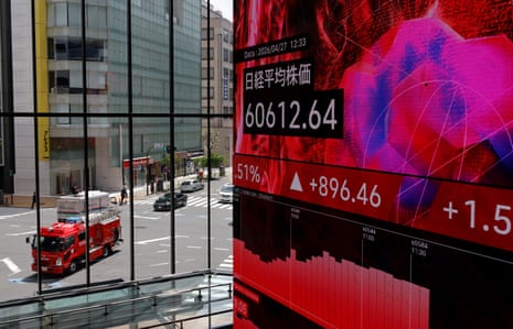 A stock indicator board in Tokyo, Japan, where the Nikkei 225 index hit a new intraday high.