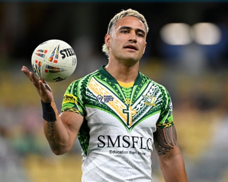 Valentine Holmes warms up before Cook Islands meet the Kangaroos at Queensland Country Bank Stadium