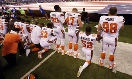 Members of the Cleveland Browns take a knee during the national anthem in Indianapolis, Sunday, Sept. 24, 2017. (AP Photo/Michael Conroy)