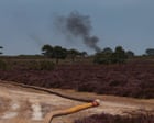 ‘Real struggle’ to tame New Forest blaze as UK set for hottest summer on record