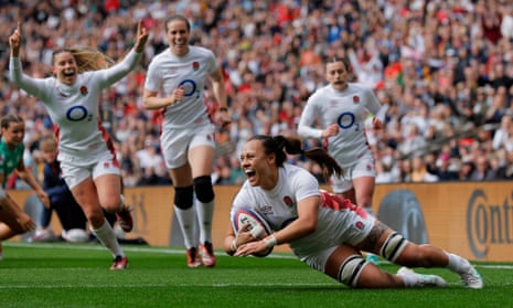 Maddie Feaunati goes over for England’s fourteenth try .