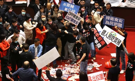 A still image from a video of the scuffle in the parliament in Taipei.