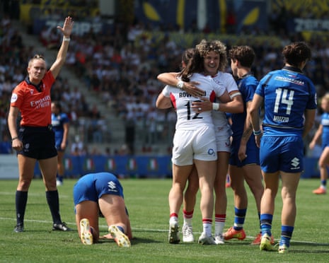 Helena Rowlandgets a hug from Ellie Kildunne.