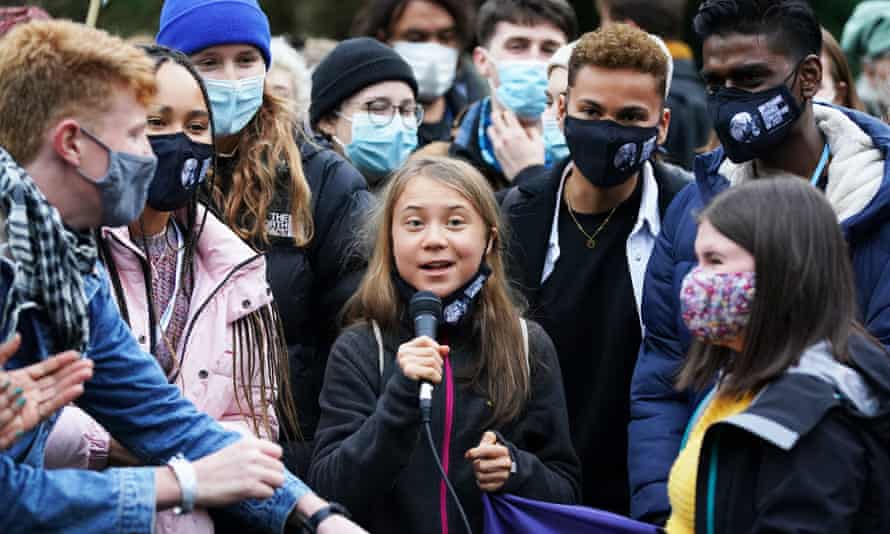 Greta Thunberg alongside other climate activists at a protest in Festival Park, Glasgow, on the first day of the Cop26 summit.