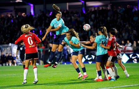 Alexia Putellas rises for a header on her WSL debut.