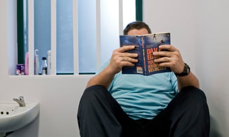 Jail sentence … an inmate reading at Wandsworth prison.