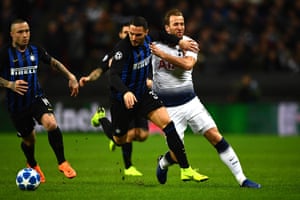 Danilo D'Ambrosio of Internazionale hands off Spurs' Harry Kane.