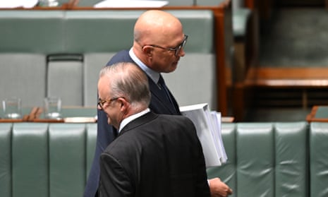Prime minister Anthony Albanese walks past opposition leader Peter Dutton during Question Time.