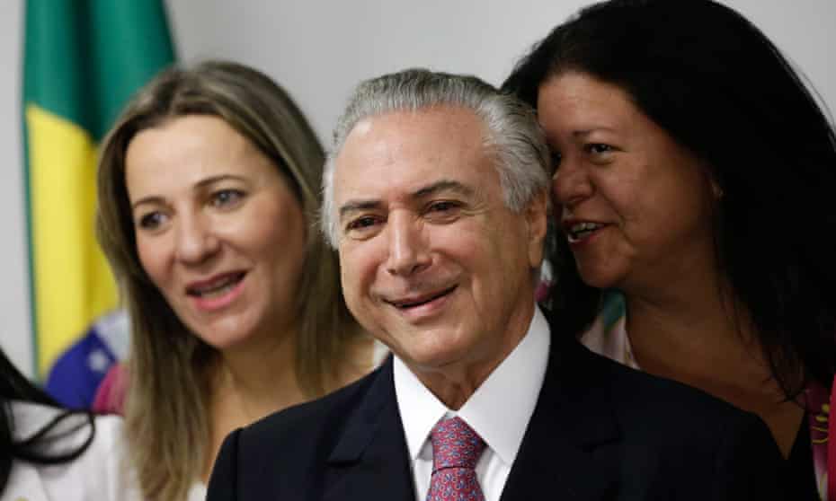 Michel Temer meets with legislators Laura Carneiro, rightm and Dulce Miranda, left, during a meeting with female deputies who support his government.
