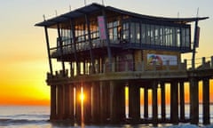 Moyo, Durban, a bar and restaurant on a pier by the sea at sunset, in South Africa