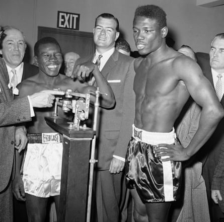 Welterweight champion Benny Paret, left, and former champion Emile Griffith at the weigh-in for the 1962 bout.