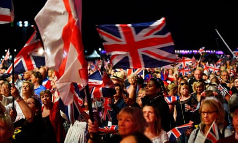 People celebrate The Last Night of the Proms in Hyde Park, London, in 2018. 