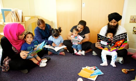 Children and parents reading together at a children’s library in Rotherham