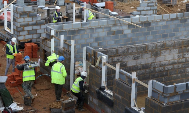 Houses under construction on a new development. Sajid Javid says up to 300,000 new homes a year need to be built.