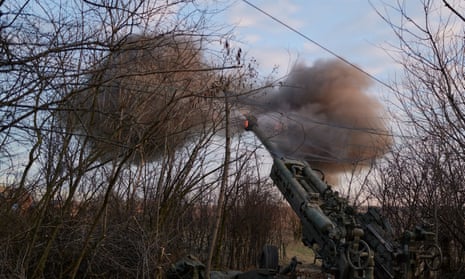 Soldiers of the Ukrainian 55th artillery brigade operate on the frontline with a US-made Howitzer M777 cannon amid artillery fights on 29 December 2022 in Bakhmut, Ukraine.