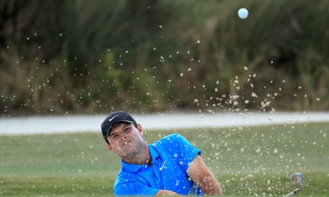 Patrick Reed plays out of a bunker at the Hero World Challenge in the Bahamas.