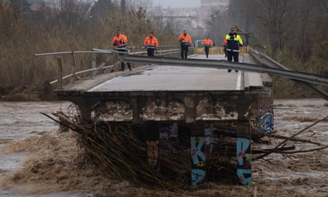 Police inspect a bridge brought down by Storm Gloria, in Malgrat de Mar, near Girona.