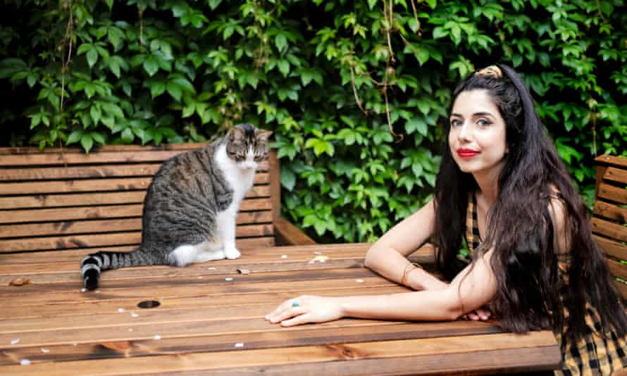 Sirin Kale and her cat Larry.