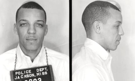 David Dennis, seen in a booking shot during the civil rights movement.
