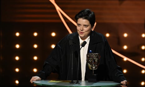 Charlotte Wells accepts the outstanding British debut Bafta.