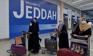 Coronavirus live: UK sees daily cases rise to over 50,000; WHO warns indoor socialising driving infections | World news 2 Passengers arrive at King Abdulaziz International Airport in the Red Sea coastal city of Jeddah, Saudi Arabia.