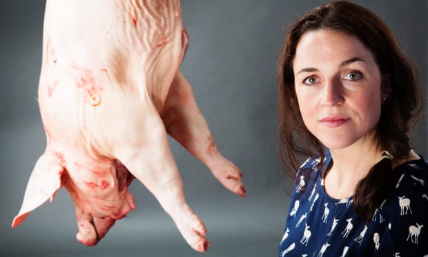 Louise Gray author of the book The Ethical Carnivore Edinburgh seen with a pork carcass in Edinburgh, Scotland UK