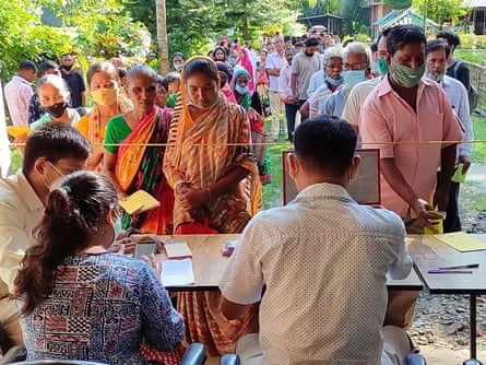 Patients and relatives line up to register at the camp in Rowmari village, the first set up by the Ant.