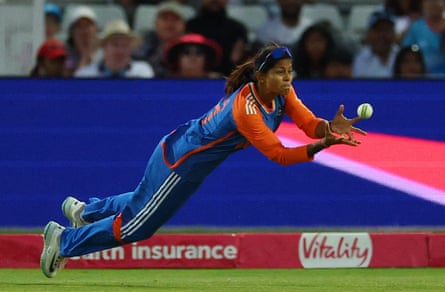 India’s Radha Yadav takes a catch to dismiss England’s Amy Jones off the bowling of Arundhati Reddy.