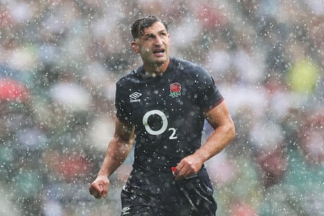 Jonny May of England looks on in the rain during the Summer International match between England and Fiji at Twickenham.