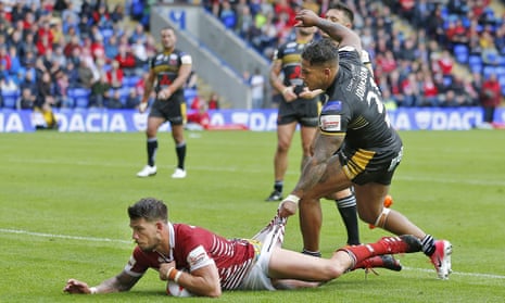 Oliver Gildart rounds off Wigan’s win with their fourth try