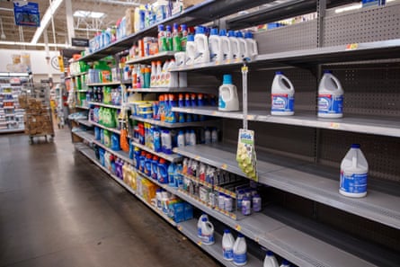 Bleach stock runs low at a Walmart in Alexandria, Virginia on 12 March 2020.