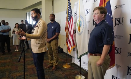 Mayor Chokwe Antar Lumumba discusses Jackson’s water crisis alongside the EPA administrator, Michael Regan, and the Mississippi governor, Tate Reeves, right.