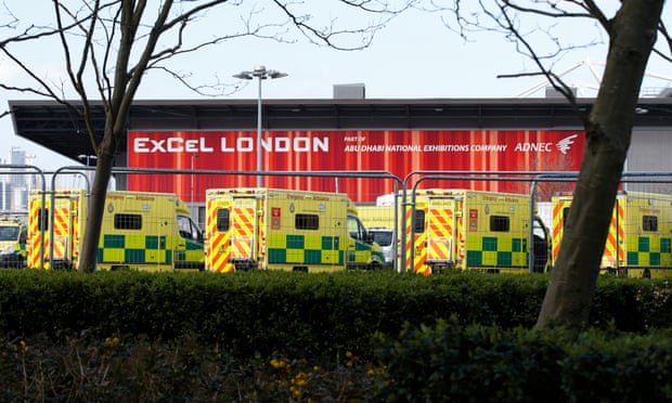 Ambulances lining up outside the new NHS Nightingale field hospital in London