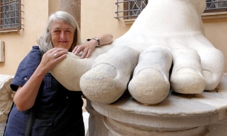 Mary Beard with a statue of the Emperor Constantine in Rome.